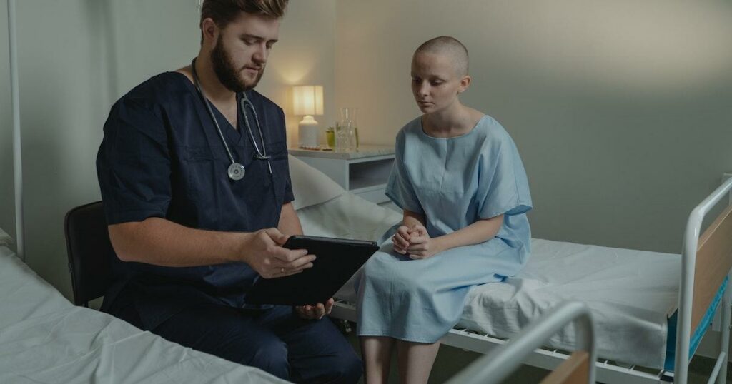 Nurse and patient reviewing a do-not-resuscitate order